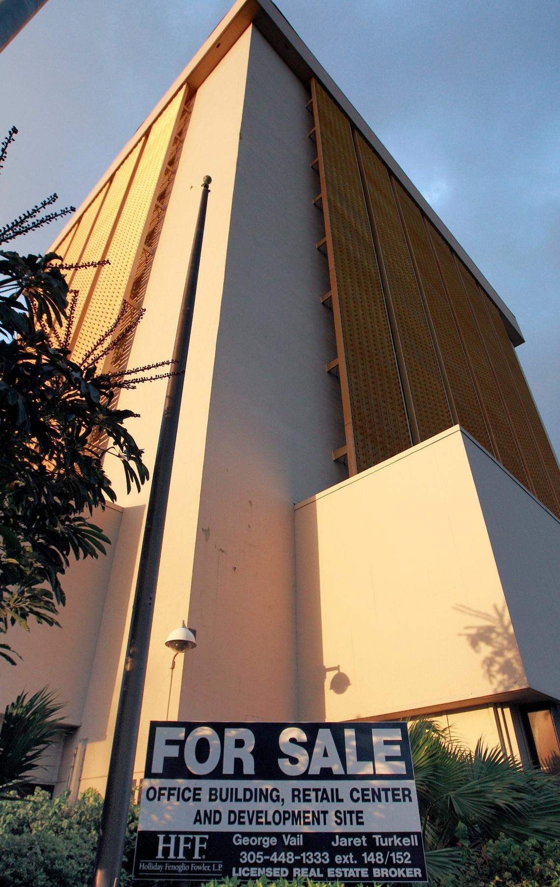 In 2008, a “for sale” sign stands on the southeast corner of Biscayne Boulevard and 79th Street as government offices moved out of the old INS building and into several buildings throughout Miami-Dade County.