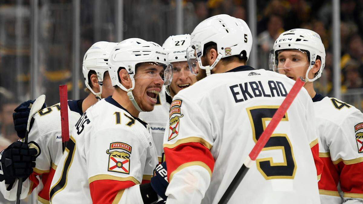May 12, 2024; Boston, Massachusetts, USA; Florida Panthers center Evan Rodrigues (17) reacts with defenseman Aaron Ekblad (5) after a goal during the second period in game four of the second round of the 2024 Stanley Cup Playoffs against the Boston Bruins at TD Garden. Mandatory Credit: Bob DeChiara-USA TODAY Sports