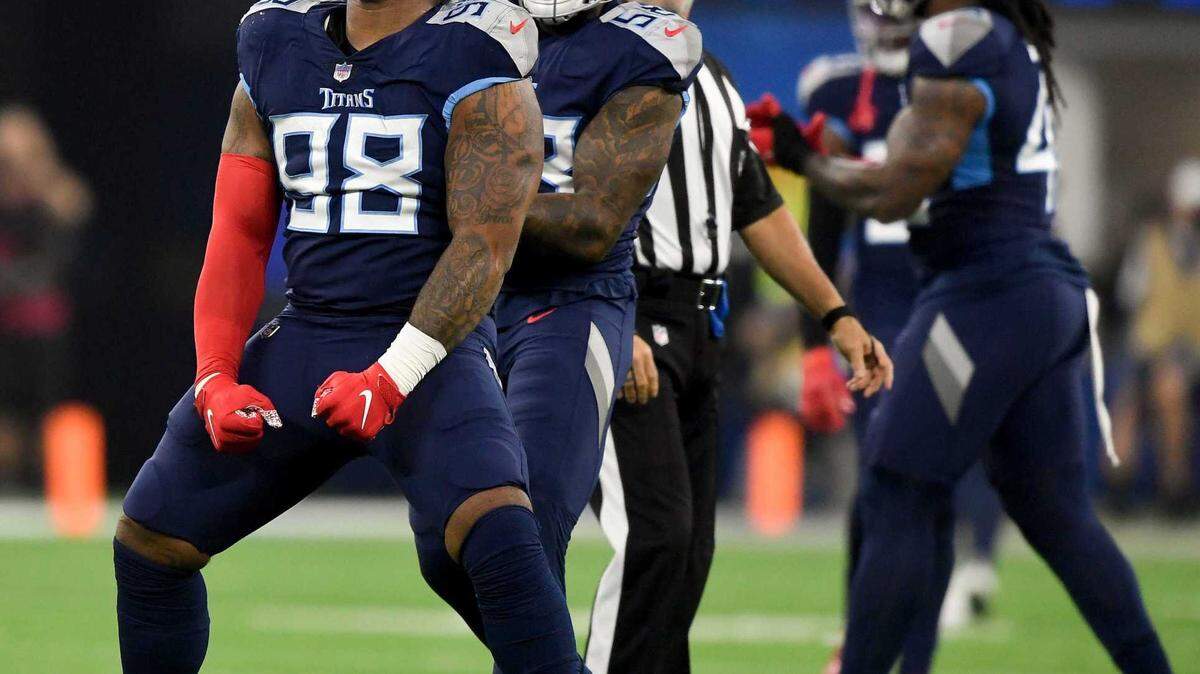 Tennessee Titans defensive tackle Jeffery Simmons (98) celebrates after sacking Los Angeles Rams quarterback Matthew Stafford (9) during the first quarter at SoFI Stadium Sunday, Nov. 7, 2021 in Inglewood, Calif. Titans Rams 038