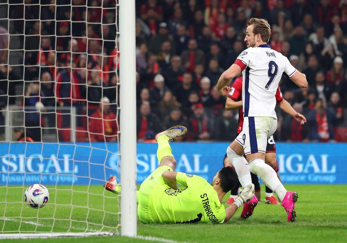 TIRANA, ALBANIA - NOVEMBER 16: Harry Kane of England scores his team's first goal during the FIFA World Cup 2026 qualifier match between Albania and England at Air Albania Stadium on November 16, 2025 in Tirana, Albania. (Photo by Alex Pantling/Getty Images)