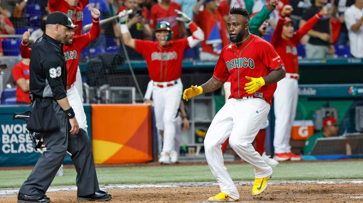 Mexico left fielder Randy Arozarena (56) sores in the seventh inning against Puerto Rico during the World Baseball Classic quarterfinal at LoanDepot Parkin Miami on Friday, March 17, 2023.