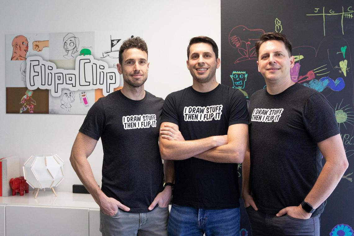 Adrian Ofman, chief operating officer of Visual Blasters, left, Jonathan Meson, co-founder and CEO, middle, and Marcos Meson, co-founder and vice president of marketing, are photographed in their Miami office on Monday, July 11, 2022.