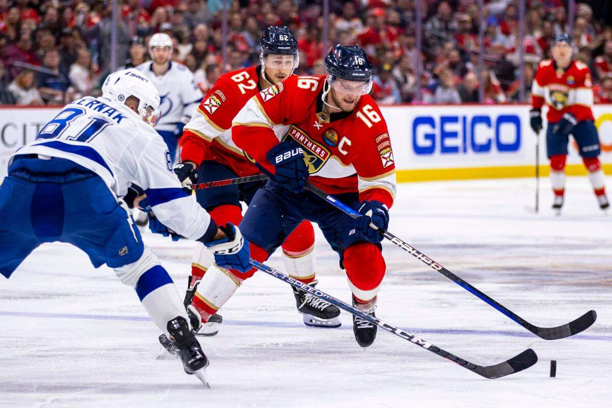 Florida Panthers center Aleksander Barkov (16) controls the puck on a fast break while guarded by Tampa bay Lightning defender Erik Cernak (81) during the second period of an NHL game at FLA Live Arena in Sunrise, Florida, on Friday, October 21, 2022.