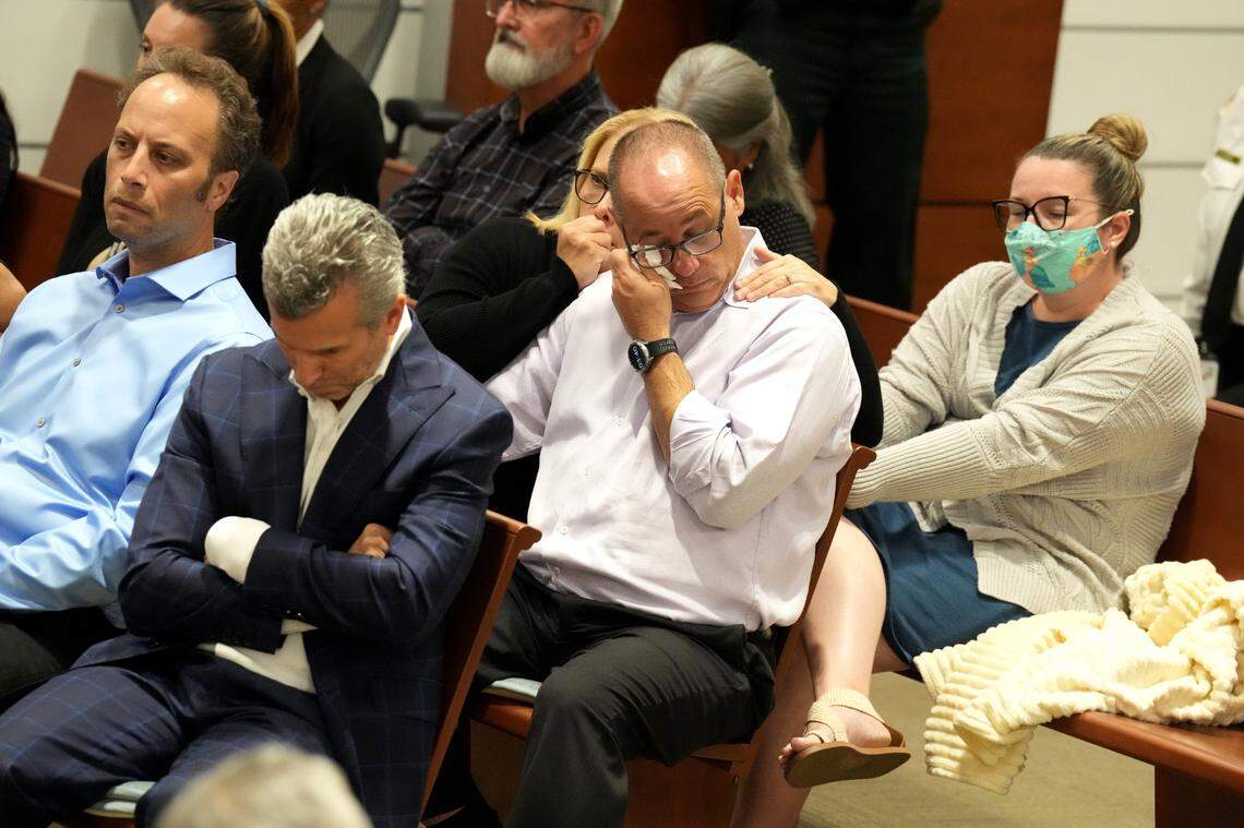 Max Schachter, left, and Fred Guttenberg — both parents of students murdered at Marjory Stoneman Douglas High School in 2018 — react to witness testimony during the first week of a sentencing trial for shooter Nikolas Cruz at the Broward County Courthouse in Fort Lauderdale.