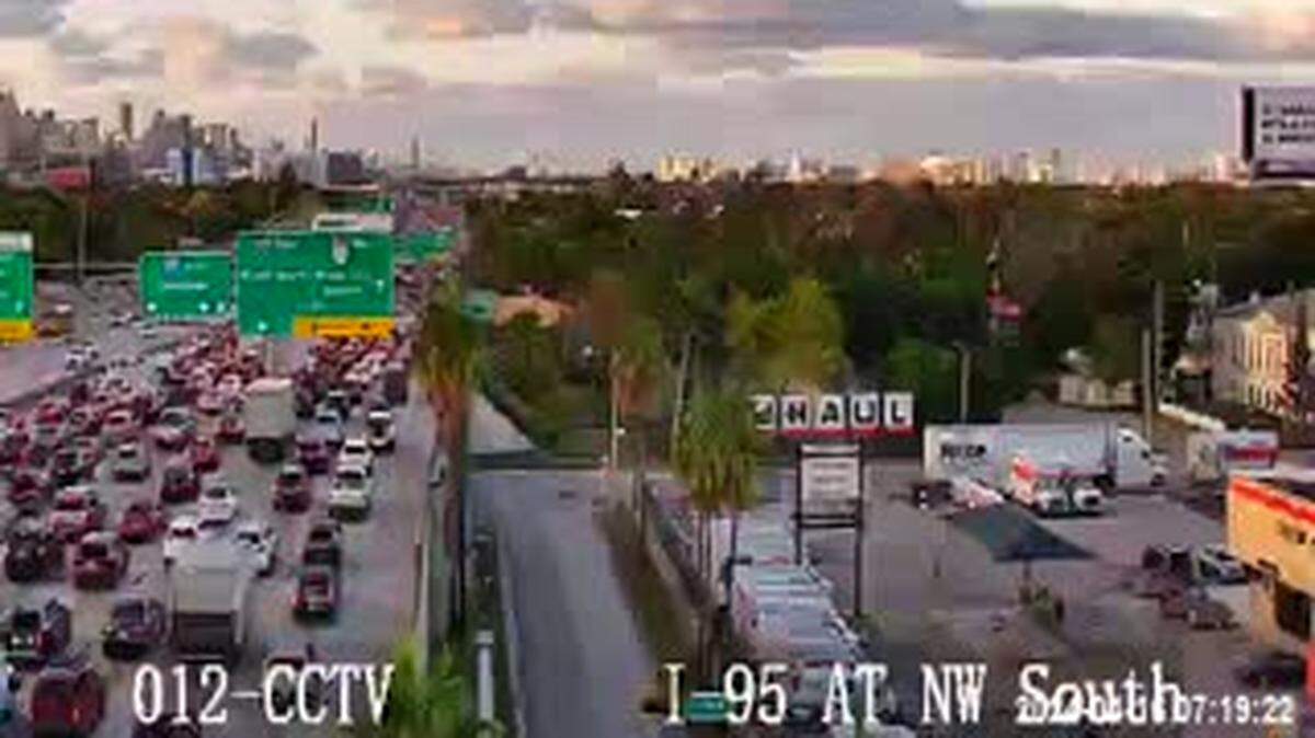 The traffic mess around Northwest 54th Street behind the rollover on Interstate 95.