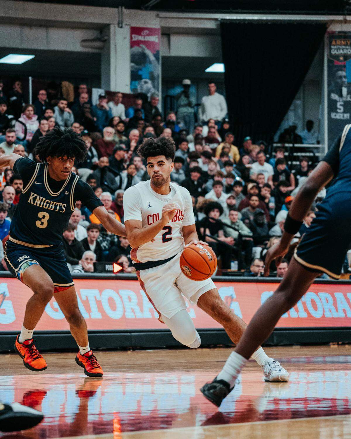 Columbus star guard Cayden Boozer drives to the basket during Monday’s win over Arizona’s Perry High at the Hoophall Classic in Springfield, Mass.