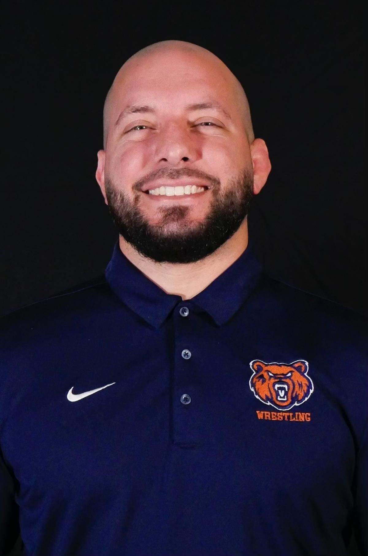 Mater Lakes wrestling coach Brandon Neifeld