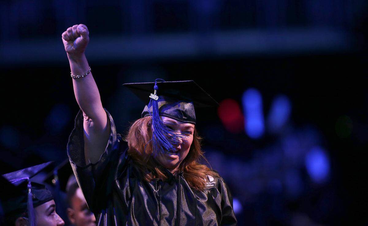 Miami Dade College student Ruth Castillo, a 58 years old woman graduating as social worker reacts as she gets a special recognition during the 2019 MDC’s Hialeah and Wolfson Campuses Commencement Ceremony, the last one for President Dr. Eduardo J. Padrón who is retiring after 25 years as president at the UM Wastco Center in Coral Gables, on Saturday May 04, 2019.