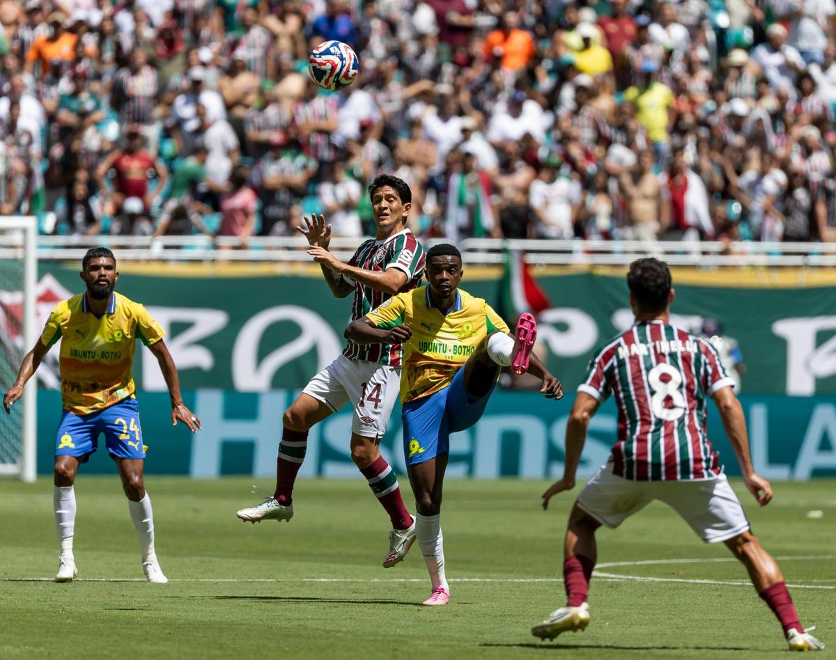 Fluminense FC forward German Cano (14) competes for the ball against Mamelodi Sundowns midfielder Teboho Mokoena (4) in the first half of their FIFA Club World Cup Group F third-round match at Hard Rock Stadium on Wednesday, June 25, 2025, in Miami Gardens, Fla.