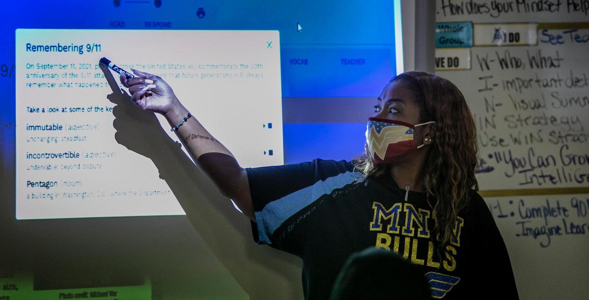 Dannielle Boyer tells her students that her “Uncle J,” a family friend, died on 9/11 while working as a chef at the Windows on the World restaurant, located in the North Tower of the World Trade Center.