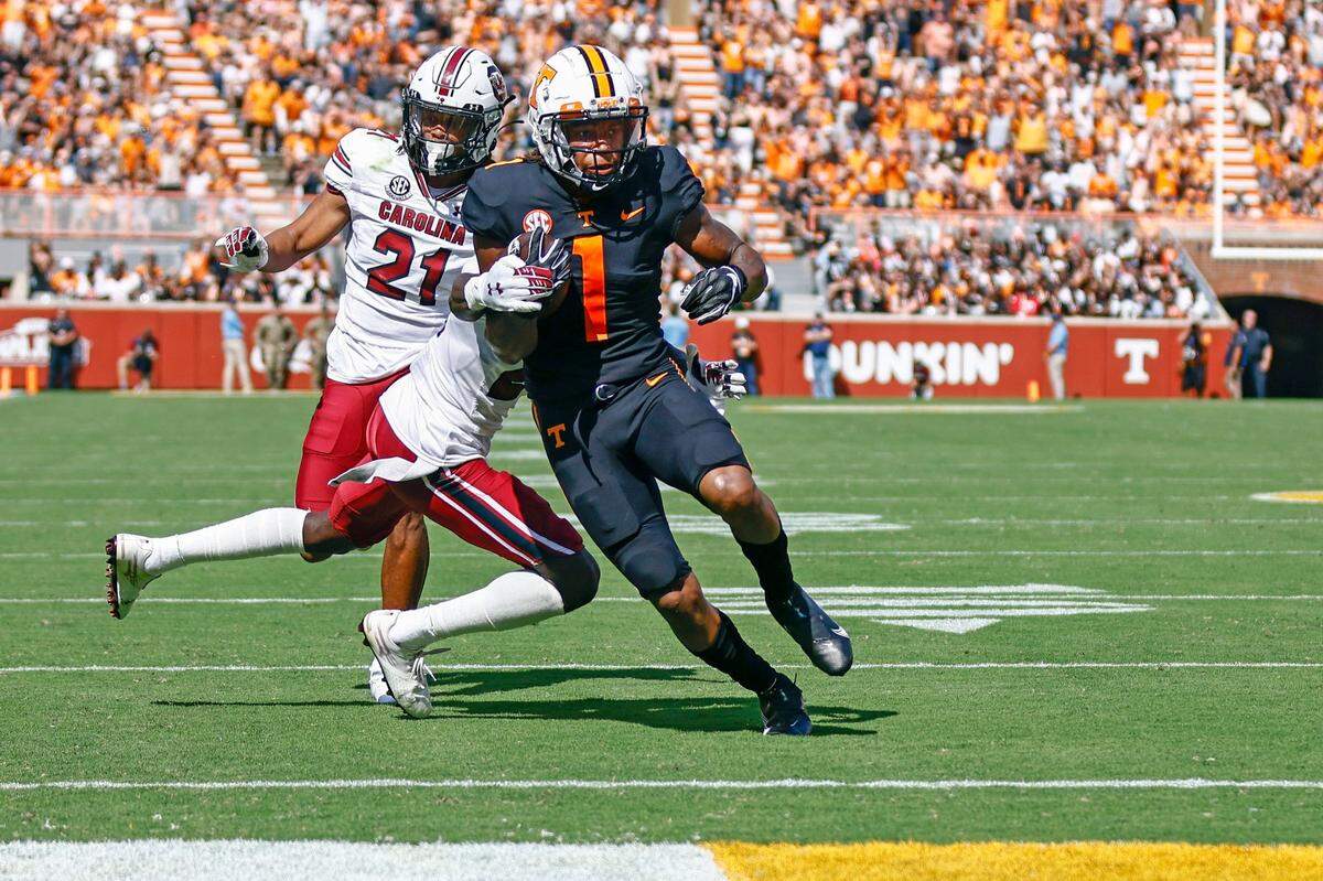Tennessee wide receiver Velus Jones Jr. (1) crosses the goal line for a touchdown as he escapes South Carolina’s defense during the game Saturday, Oct. 9, 2021, in Knoxville, Tenn. (AP Photo/Wade Payne)