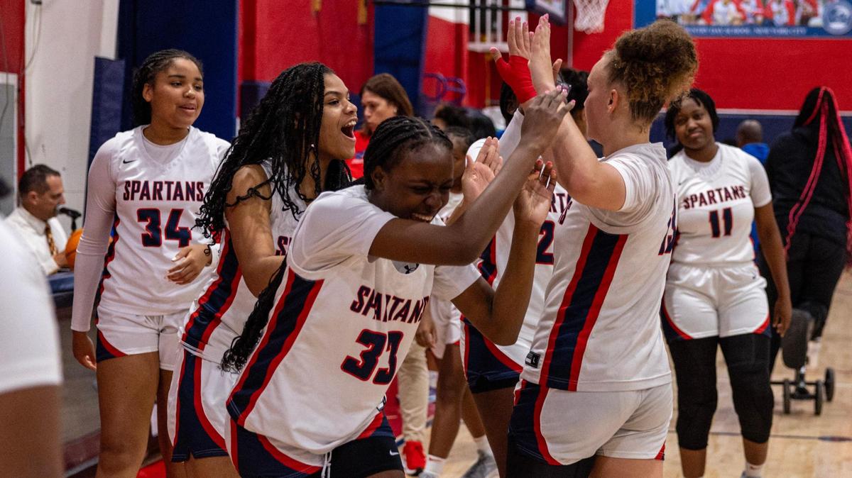 Miami Country Day players react to defeating Somerset academy to win the Regional 4-3A girls basketball final at Miami Country Day School in Miami, Florida on Thursday, February 22, 2024.