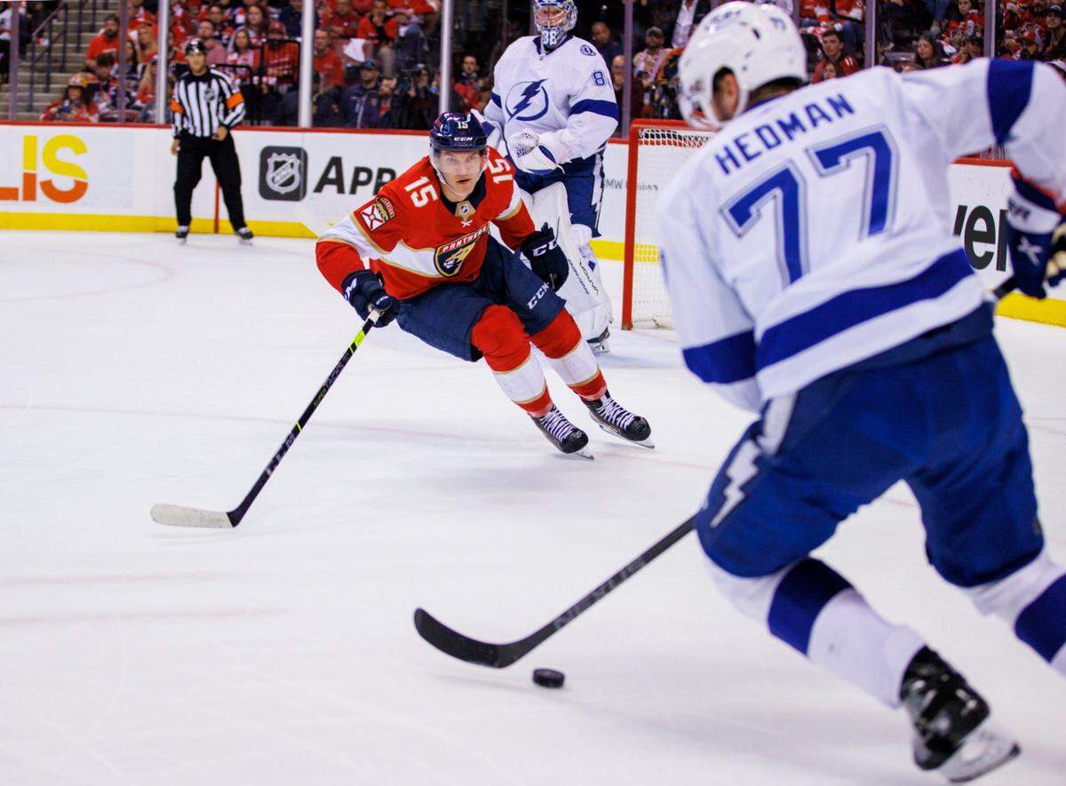 Florida Panthers center Anton Lundell (15) defends Tampa Bay Lightning defenseman Victor Hedman (77) during the first period of Game 2 of a second round NHL Stanley Cup series at FLA Live Arena on Thursday, May 19, 2022 in Sunrise, Fl.