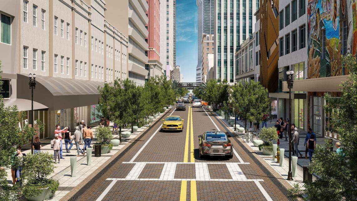 An architectural rendering shows how Miami’s Flagler Street will look once a reconstruction is completed. The project is bringing wider sidewalks, trees, new lighting and a curbless street suitable for special events.