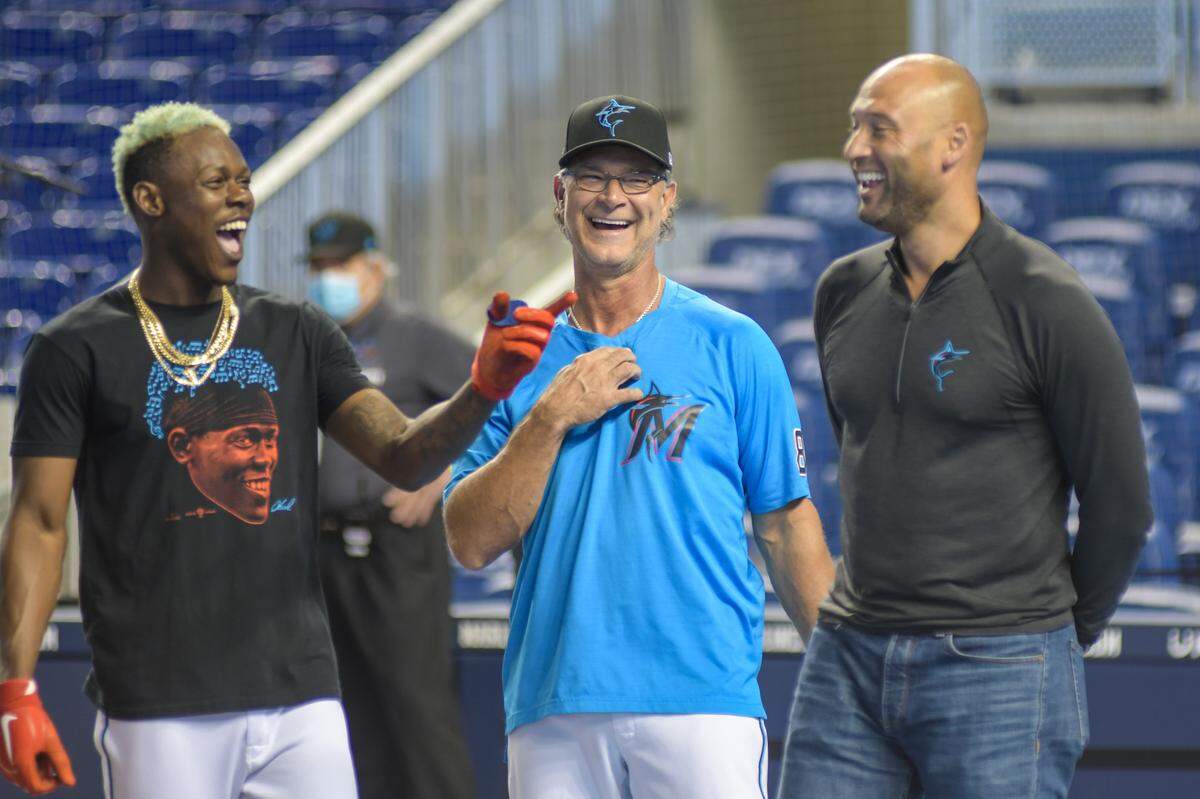 Miami Marlins middle infielder Jazz Chisholm Jr., manager Don Mattingly and CEO Derek Jeter pregame at loanDepot park on Saturday, July 24, 2021.
