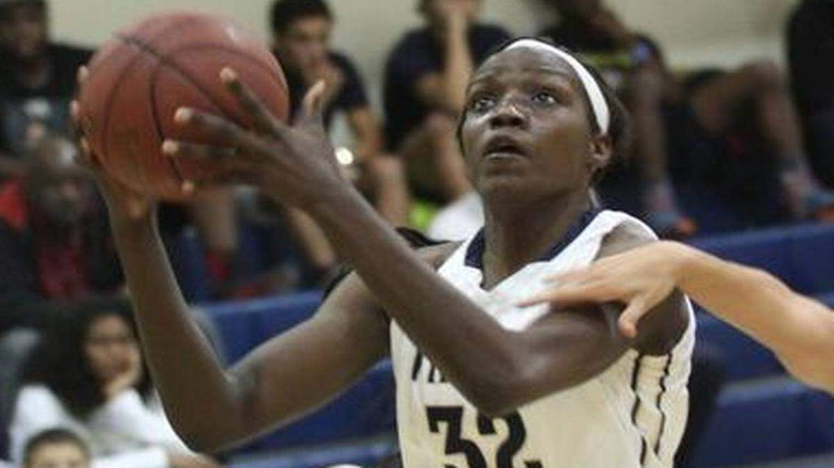 Former Miami High star Beatrice Mompremier, shown here in her high school days, had 24 points and 21 rebounds to lead No. 24 University of Miami to a 63-55 win over No. 19 Marquette in the Preseason WNIT semifinal Nov. 15, 2018.