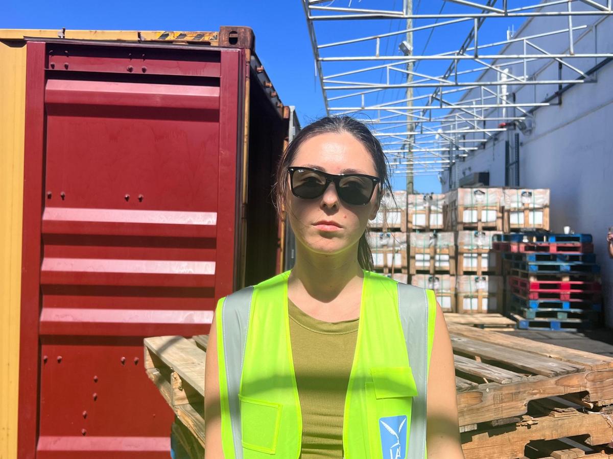 Ece Saglam, 32, in the warehouse of her global logistics company. The company has partnered with the Turkish consulate of Miami to receive donations. The day of this photo, a Turkish American from Atlanta arrived after driving 13 hours to donate items on behalf of the computer company he works for.
