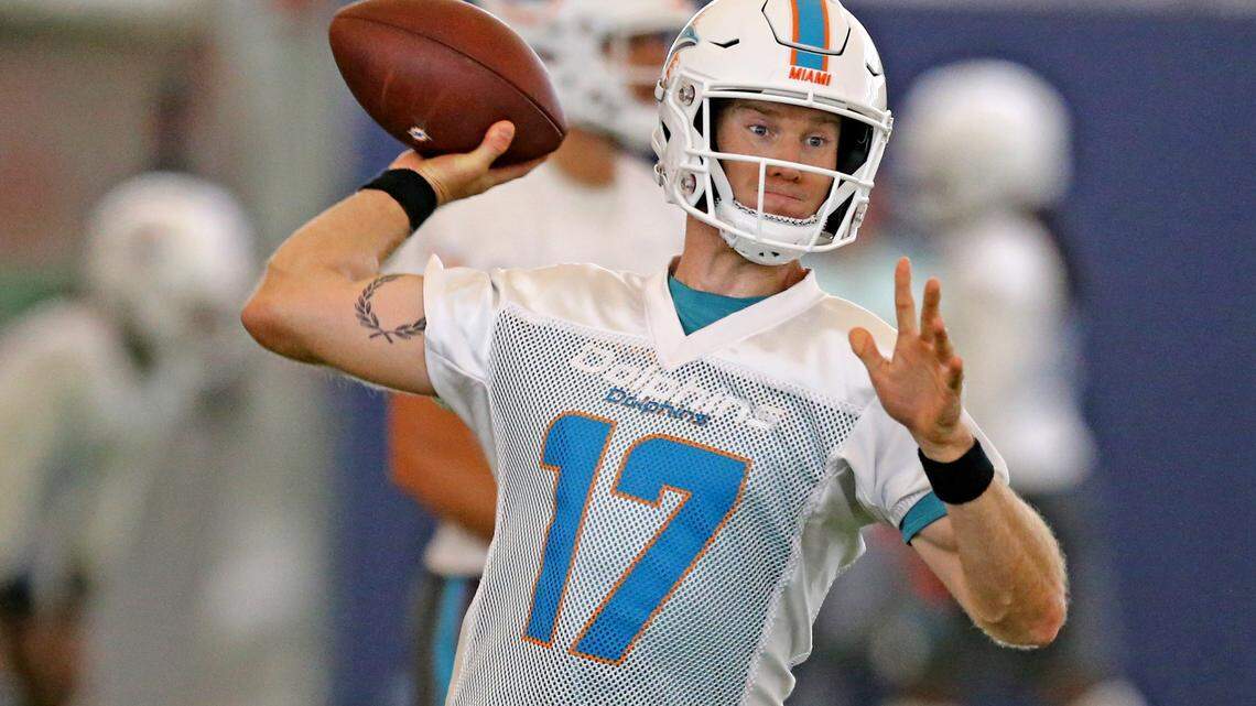 Ryan Tannehill, sporting a new tattoo on his right biceps, has impressed his coaching staff this spring.