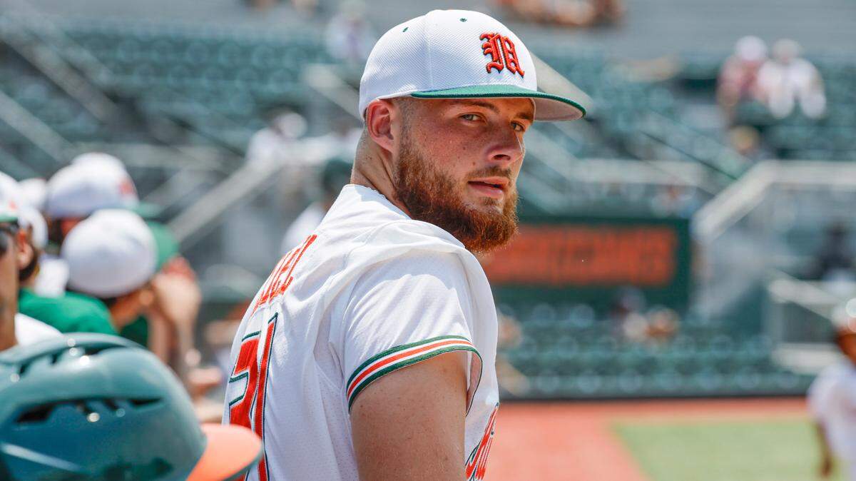 Miami Hurricanes pitcher Gage Ziehl (31) in the dugout during the game against the Pittsburgh Panthers at Alex Rodriguez Park at Mark Light Field on Coral Gables, Florida on Saturday, May 18, 2024.
