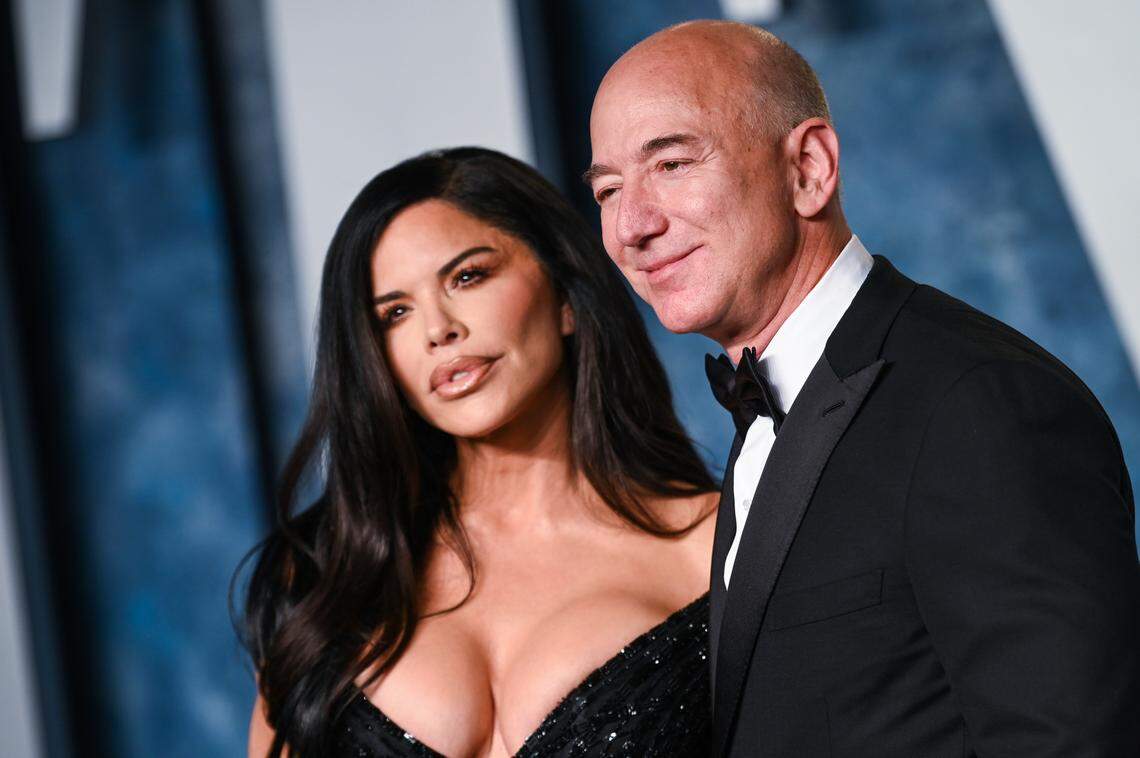 Jeff Bezos, pictured with fiancée Lauren Sanchez, snapped up a bunch of property in Indian Creek Village soon after the Amazon founder announced he was leaving Seattle (Photo by Anthony Behar/Sipa USA)