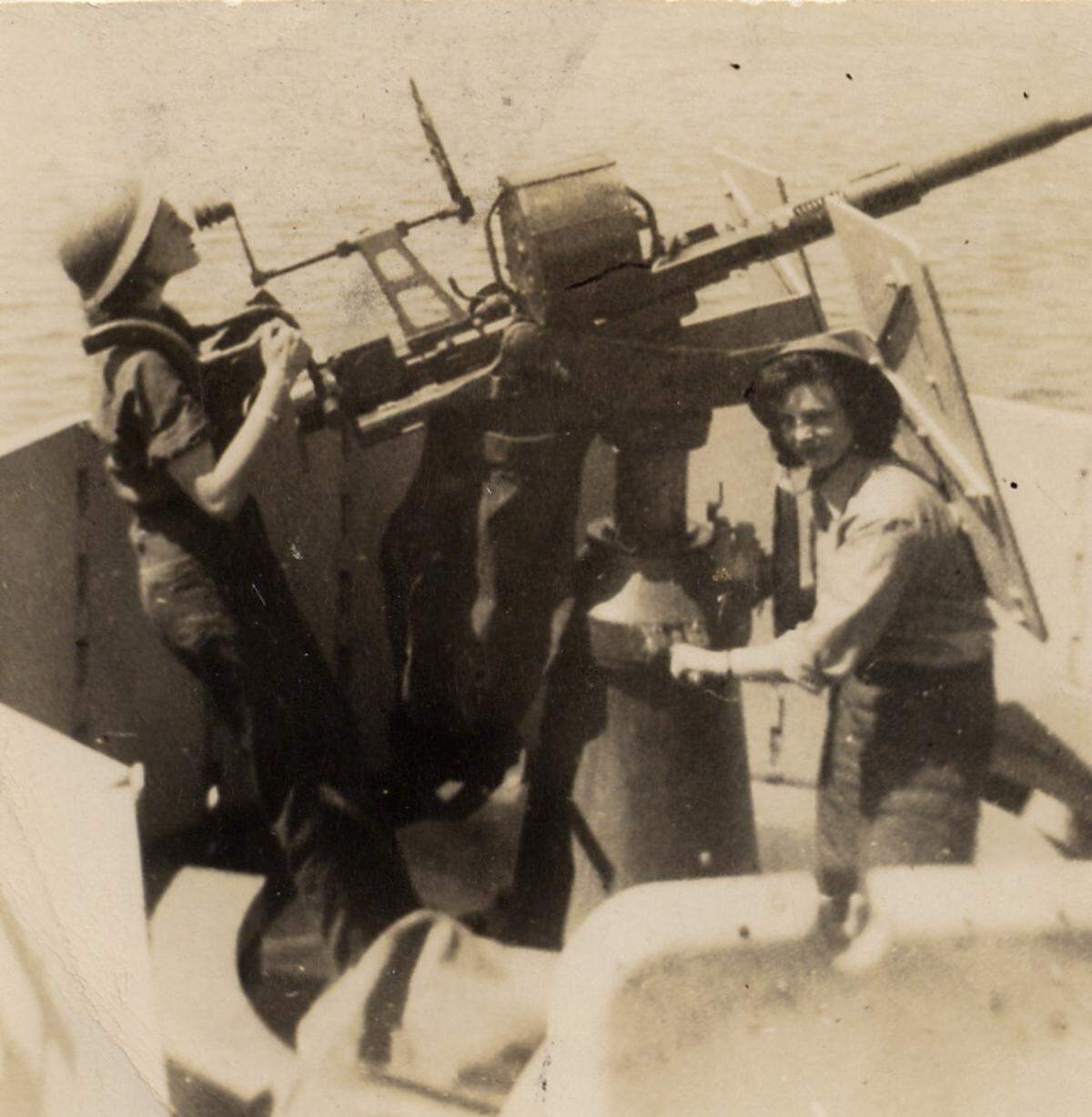 Jean Haydock and Joan Quinn served as radio operators on The Carl Oftedal, a U.S. merchant marine ship that delivered bombs to the Philippines during World War II. The two are seen here on deck.