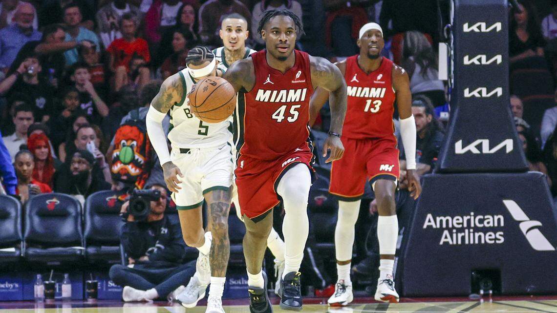 Miami Heat guard Davion Mitchell (45) drives the ball in the second half during their NBA basketball game against the Milwaukee Bucks at Kaseya Center in Miami on November 26, 2025.