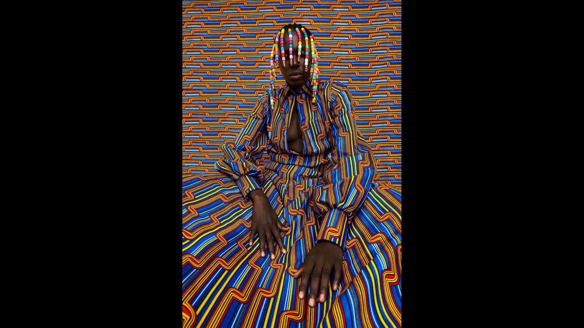 In this award-winning photo on display at the ‘Female in Focus’ exhibition at the Green Space Miami, Thandiwe Muriu, who grew up in Kenya, captures the beadwork in hair inspired by the beads she often wore as a child.