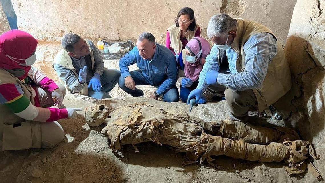 Archaeologists in Luxor unearthed a family burial site with 30 graves and pink granite sarcophagus for a pharaoh’s minister, photos show.