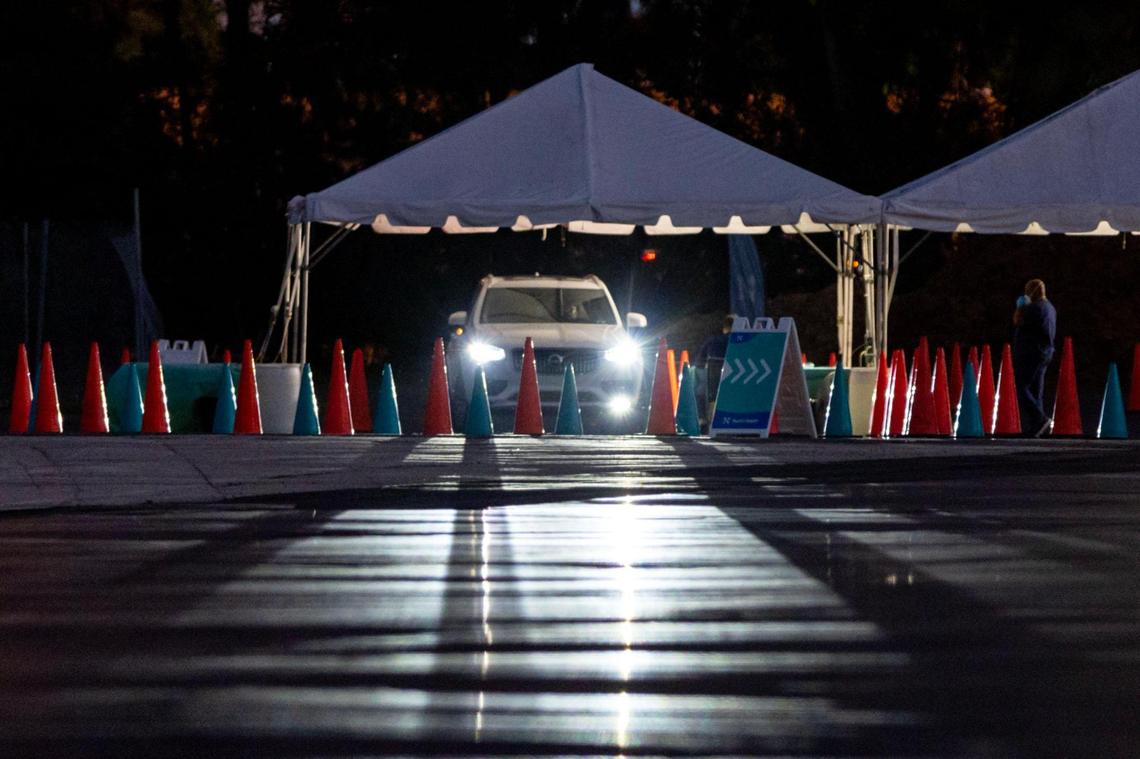 A car waits in line at the Tropical Park Nomi Health COVID-19 Testing Location in Miami, Florida, on Thursday, January 5, 2023.