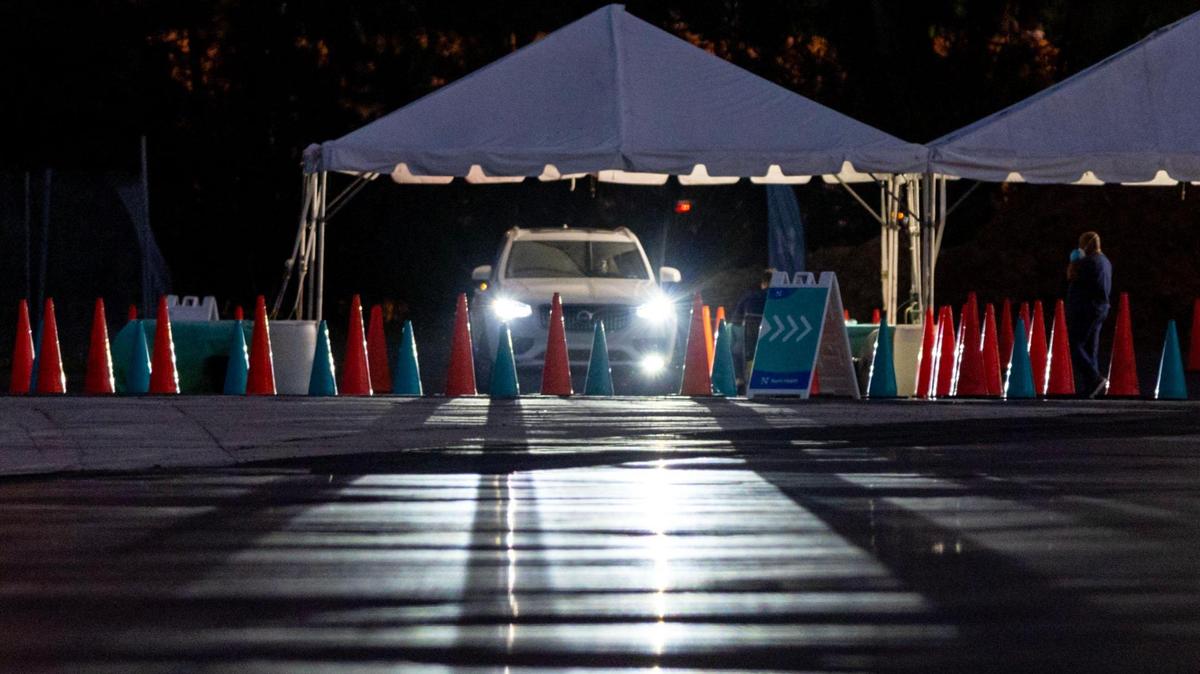 A car waits in line at the Tropical Park Nomi Health COVID-19 Testing Location in Miami, Florida, on Thursday, January 5, 2023.