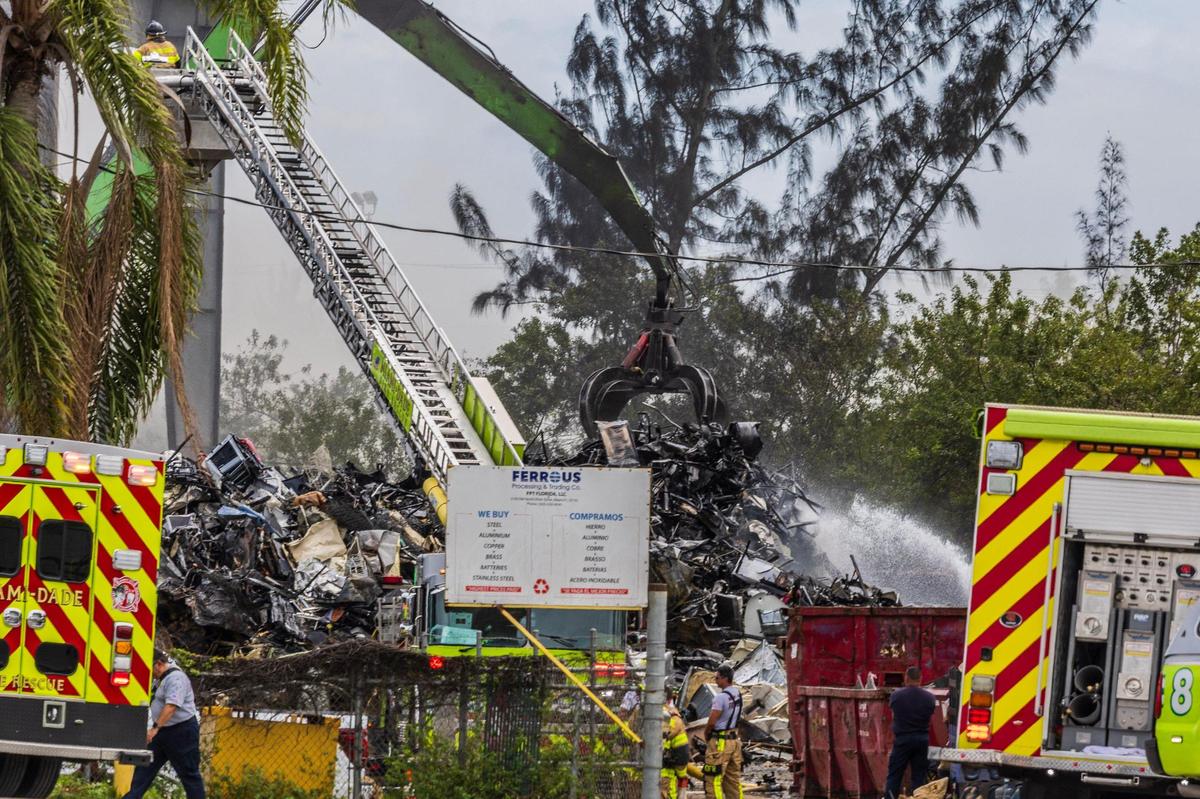 Several Miami-Dade Firefighters units battled a large fire at the Ferrous Processing and Trading scrap metal facility located at 3700 NW North River Drive, in Miami, on Thursday April 10, 2025.