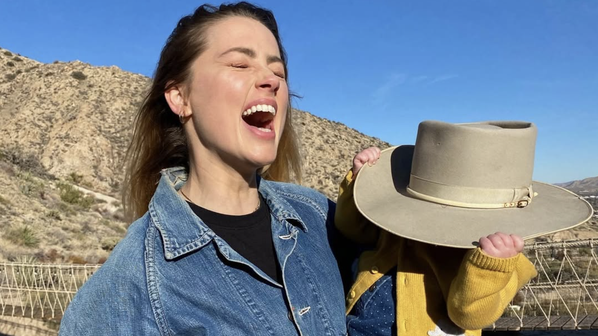 Amber Heard uses Mother’s Day to announce she welcomed twins.