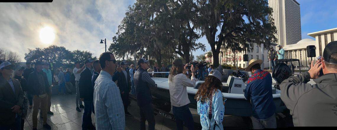 Chris Wittman and Daniel Andrews of Captains For Clean Water rally those opposed to Senate Bill 2508 that would have given the sugar industry a priority over water access from Lake Okeechobee, at the Capitol in Tallahassee, Feb. 17, 2022.