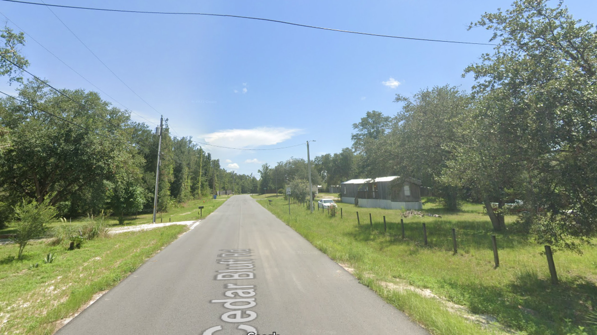 A man accused of fraudulently obtaining $3.2 million was living in a mobile home when Bay County deputies closed in for an arrest, officials say.