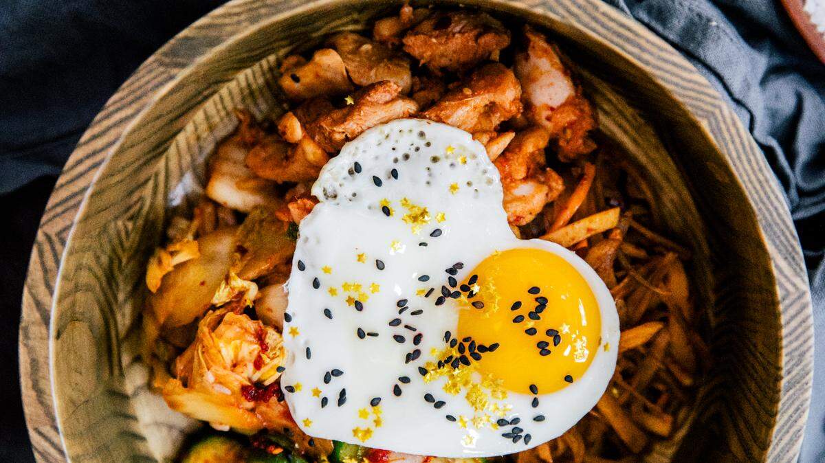 Oh, You Spicy Huh? features Korean chicken and two different kinds of kimchi.