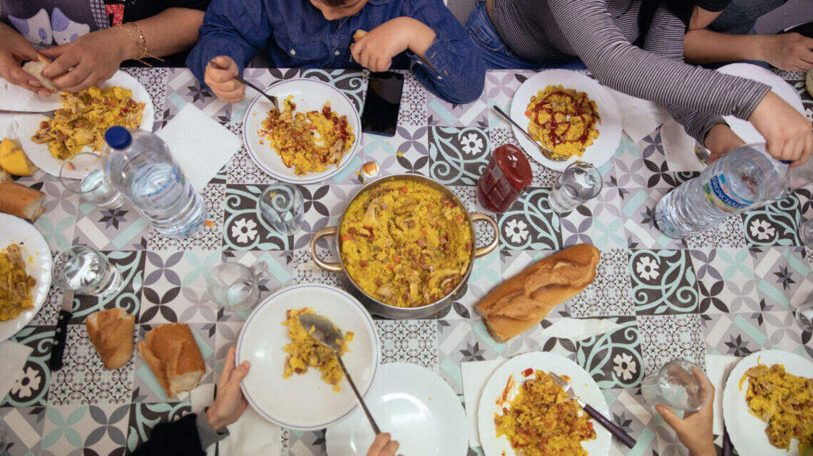 Food-Mood Connection: New Study Finds Eating Meals With Others Predicts Happiness as Reliably as Income