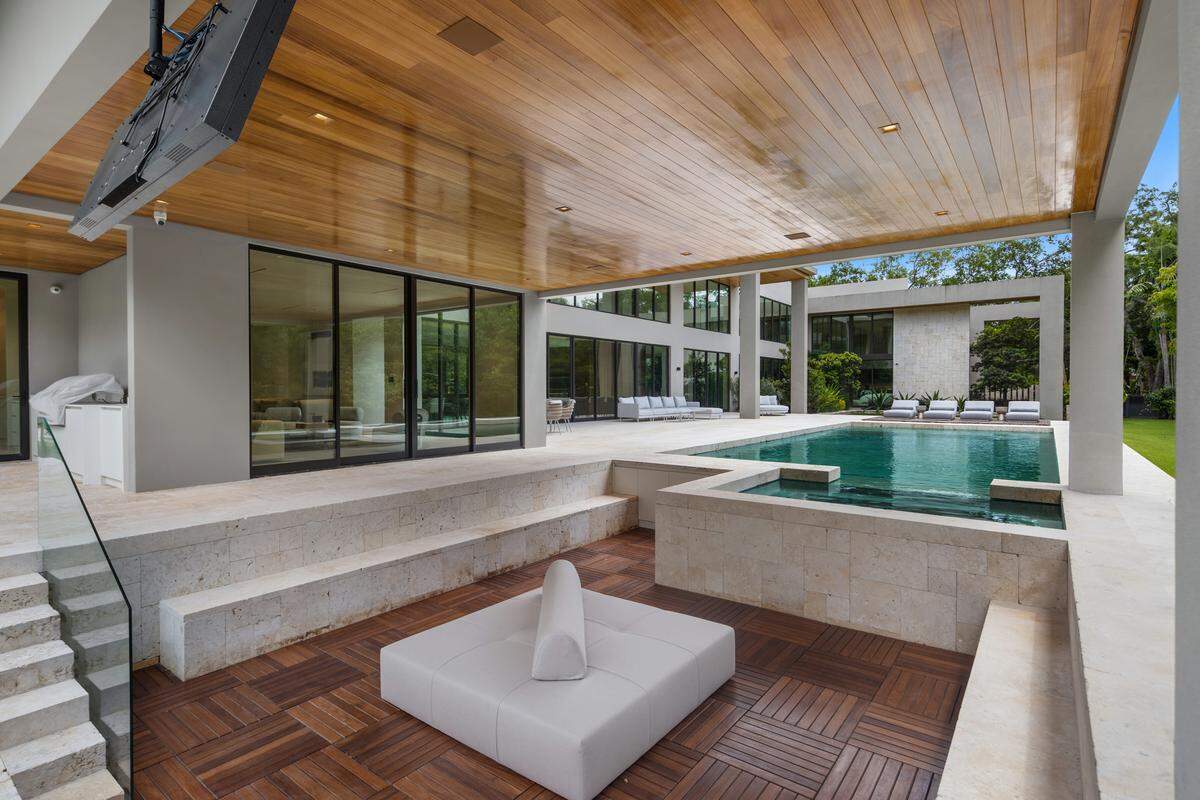 The home has multiple outdoor “conversation pits.”