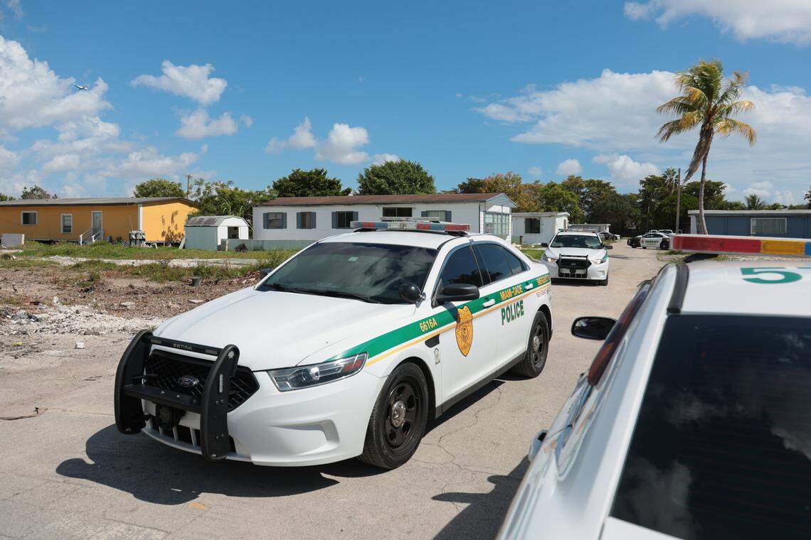 Patrol vehicles from the Miami-Dade Sheriff's Office drive around enforcing eviction notices at the Li'l Abner Mobile Home Park in Sweetwater, Florida, Monday, October 20, 2025.