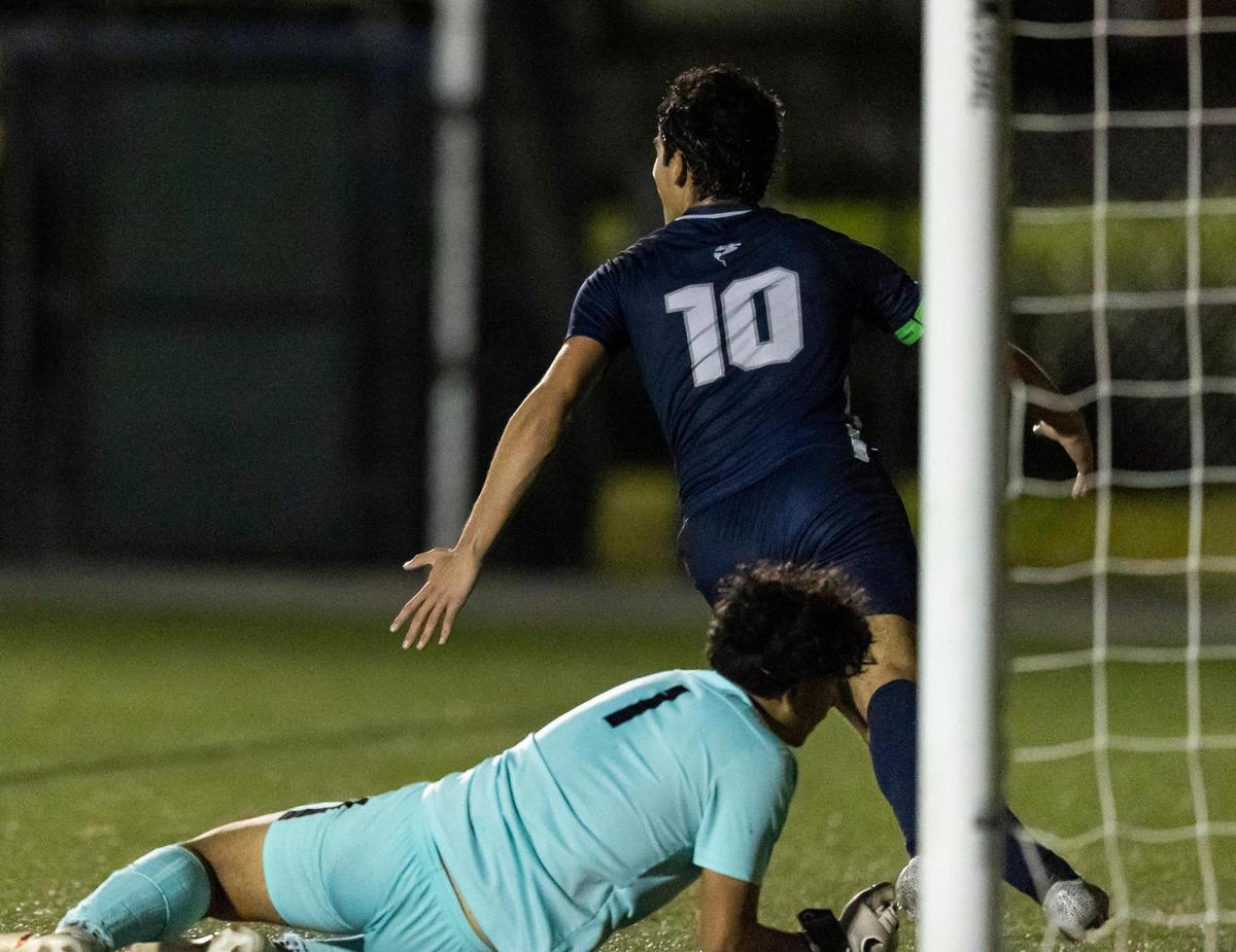 NSU’s Rafael Guerra (10) reacts after scoring a goal against La Salle’s goalkeeper Sebestian Ochoa (1) during the second half of a Region 4-3A final at NSU University School on Wednesday, Feb. 15, 2023.