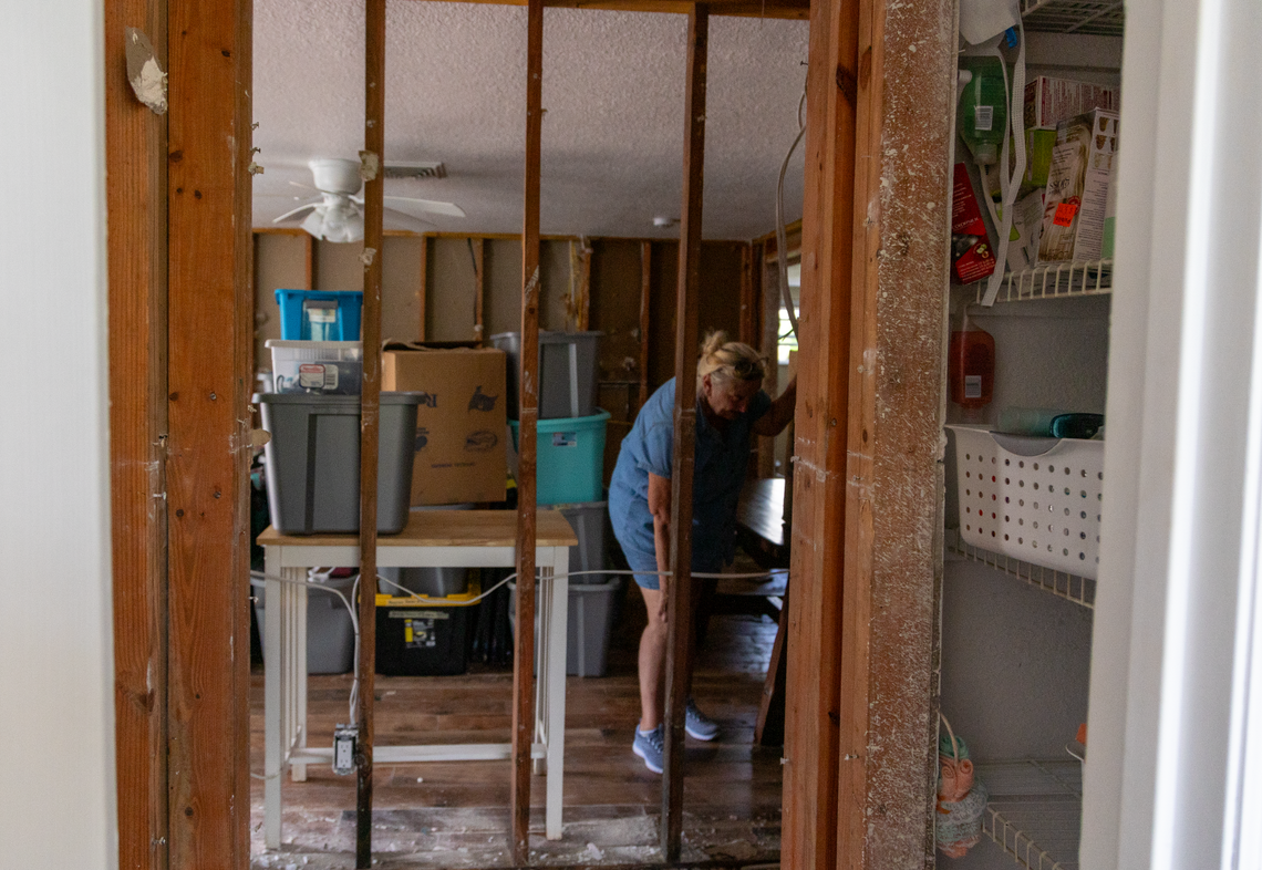 Dawn Kremer gets emotional walking around her Saint Petersburg house. She was still working on clearing out her things from her home. Water from the storm surge remained on the floor of her home more than five days after Hurricane Helene made landfall.