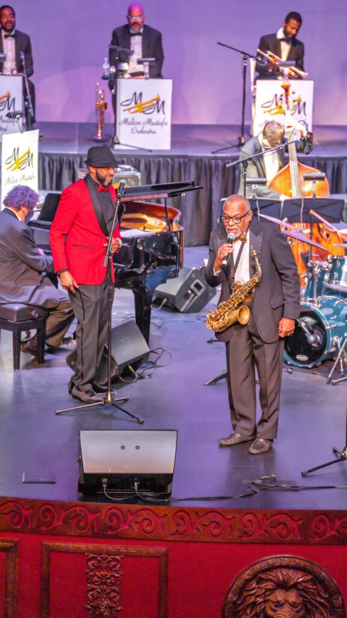 The Melton Mustafa Orchestra conducted by Melton Mustafa Jr, left, and featuring Jesse Jones.