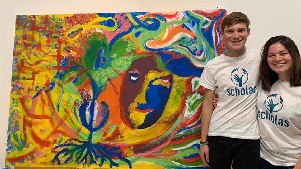 Drew Landsaw and Marina Marquis, students at Cutler Bay Senior High, traveled to Rome Dec. 10 to meet Pope Francis as part of the international citizenship program, ‘Scholas Occurrentes.’ Here they are at the inauguration ceremony of the new Scholas Occurrentes headquarters in Vatican City.