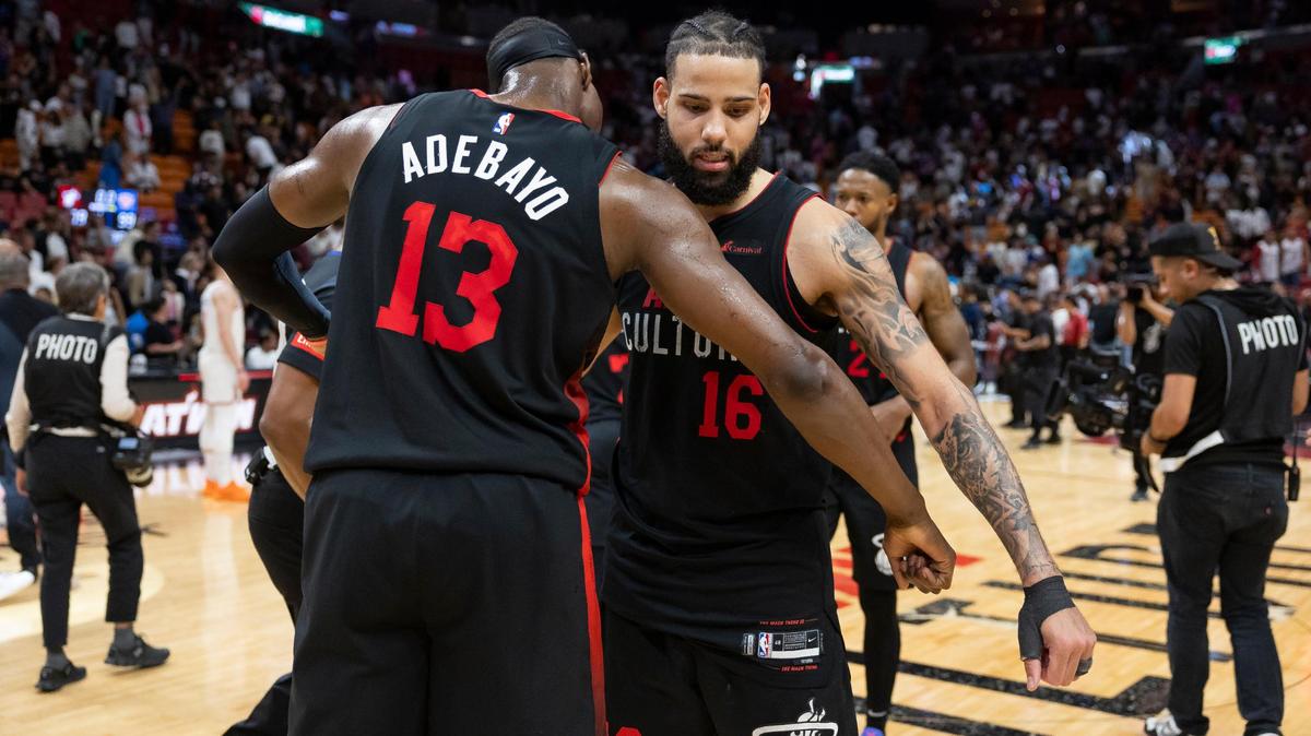 Miami Heat center Bam Adebayo (13) and forward Caleb Martin (16) celebrate after defeating the New York Knicks during their NBA game at the Kaseya Center on Tuesday, April 2, 2024, in downtown Miami, Fla.