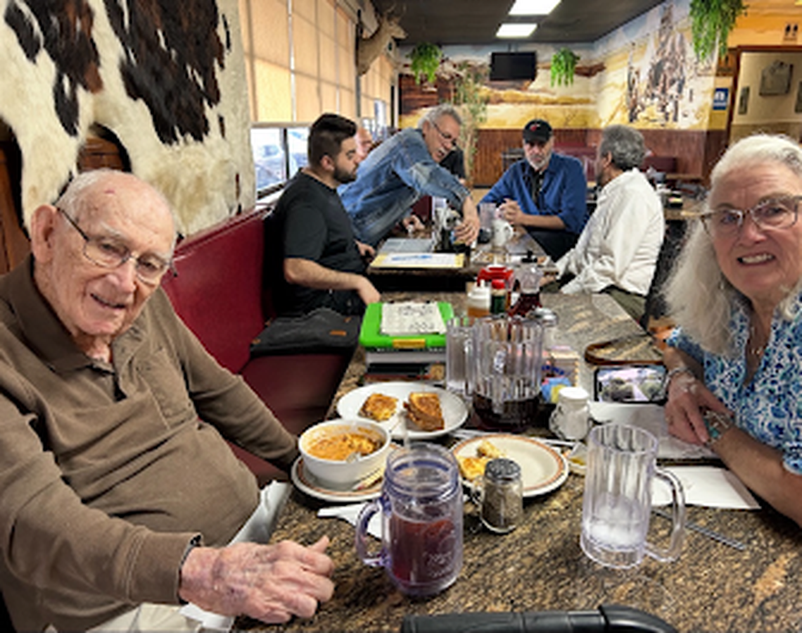 G. Holmes Braddock enjoys a meal with his daughter at Chuck Wagon, the Kendall restaurant on Southwest 117th Avenue that he went to for 30 years.