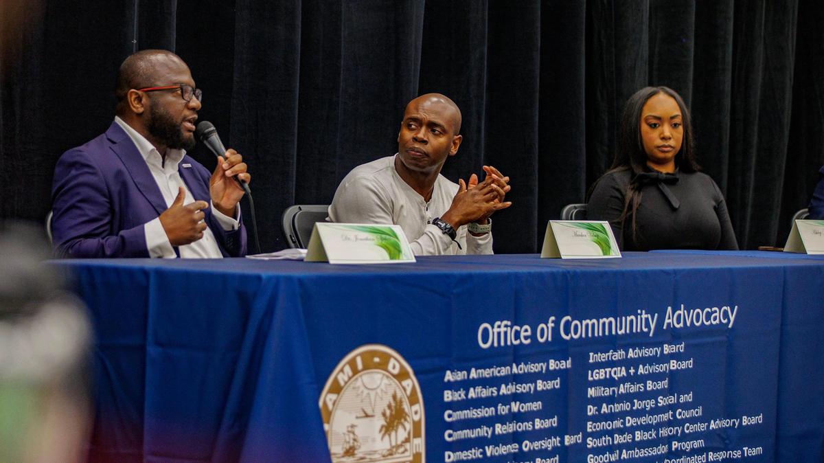 Panelists Ashley Moten Bradley and Marcken Volmy listen as Dr.Jonathan Spikes speaks as in the “Mental Health” panel during “The State of Black Miami” event at the Joseph Caleb Center. The State of Black Miami,” is celebrated with the purpose of identify and address critical, ongoing issues impacting the black communities in Miami today. on Saturday, September 30, 2023.