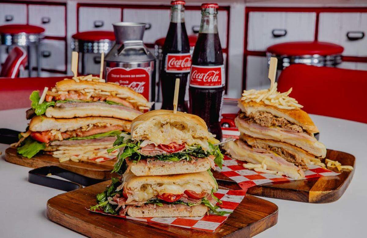 Sandwiches like pan con lechon are on the menu at El Cuban Diner.