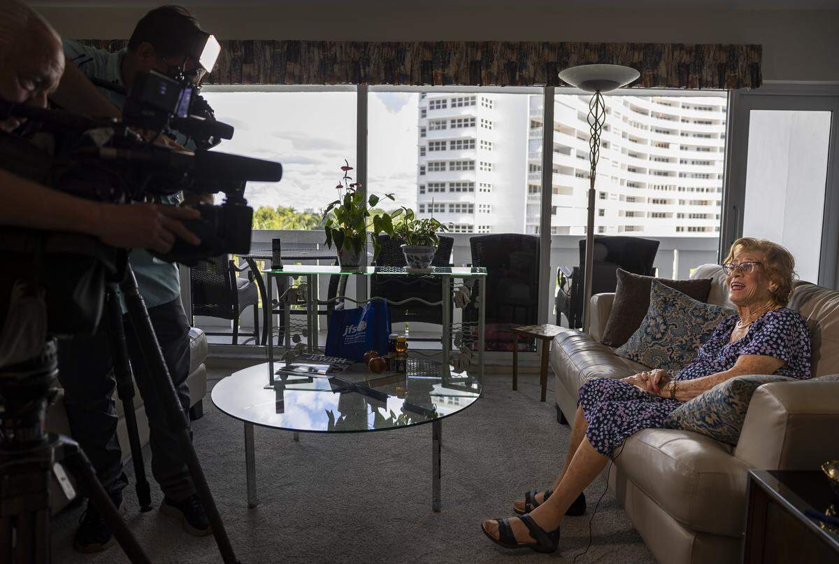 Ruth Di Stefano, a 97-year-old Holocaust survivor, retells the story of her life at her home in For Lauderdale. Di Stefano received a holiday gift bag from Goodman Jewish Family Services in anticipation of the Rosh Hashana holiday.