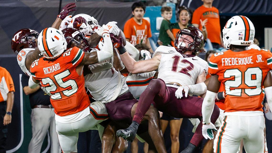 The game ended with a Virginia Tech Hail Mary attempt that was initially ruled a 30-yard, game-winning, walk-off touchdown pass from Virginia Tech Hokies quarterback Kyron Drones (1) to wide receiver Da’Quan Felton (9) but the call was overturned after a lengthy review at the ACC conference football game at Hard Rock Stadium on Friday, September 27, 2024, in Miami Gardens, Fla.