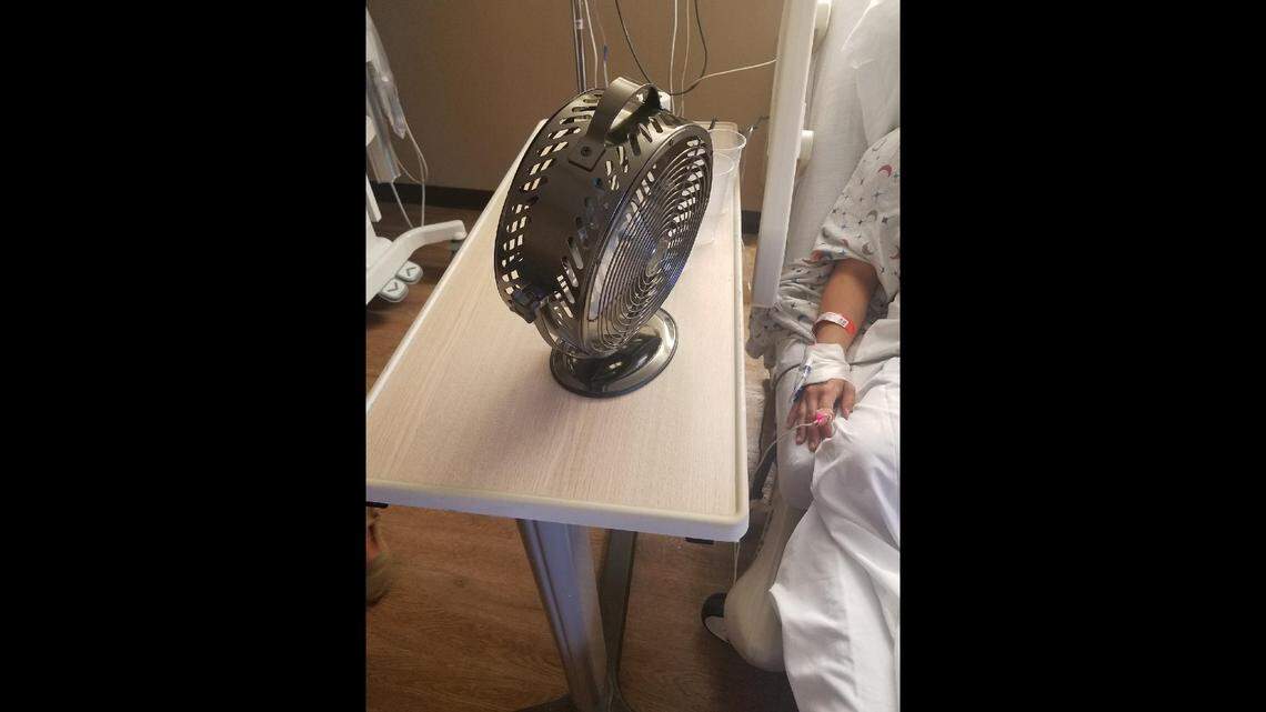 This photograph taken inside a maternity ward hospital room at Hialeah Hospital shows a fan being used to cool down Leo Perez’s step daughter following the birth of her son on Saturday afternoon. The hospital’s air conditioning system went offline for several hours on Saturday, causing stifling heat throughout the facility.