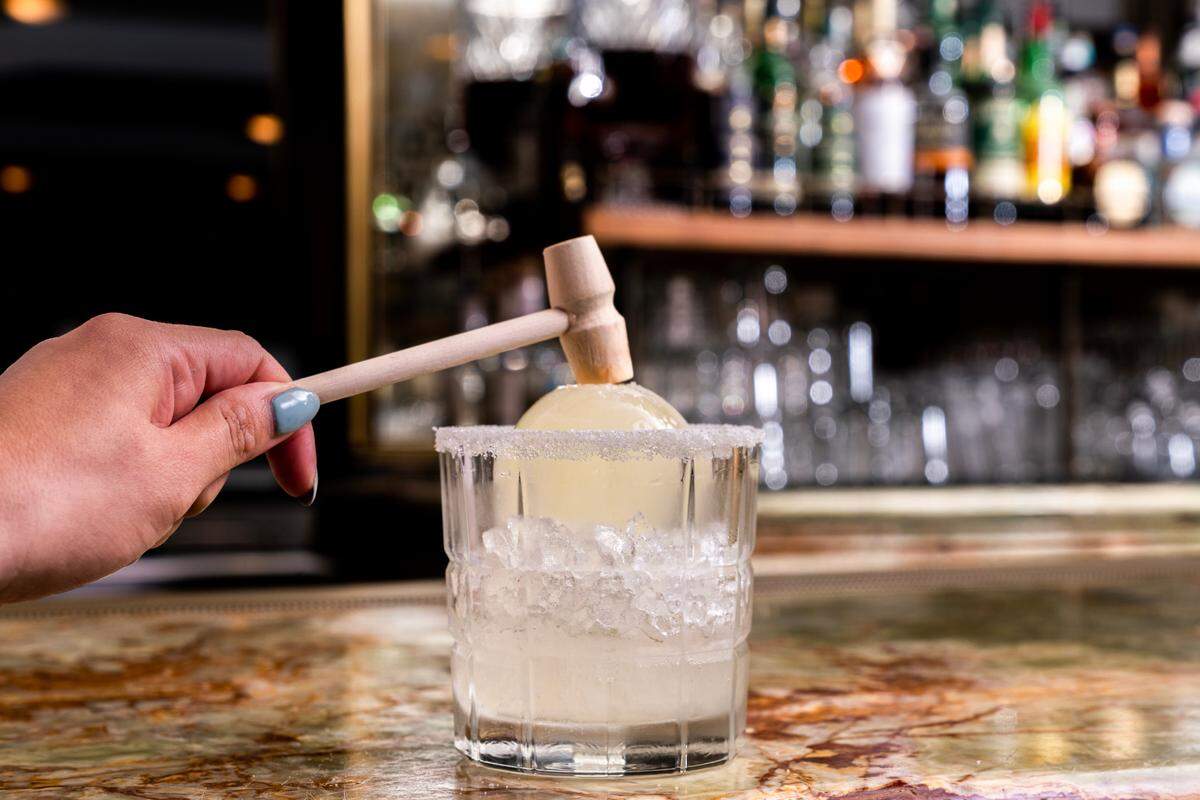 Have a little cocktail fun with the Drop Me Lemon Drop, which comes with a mini hammer.